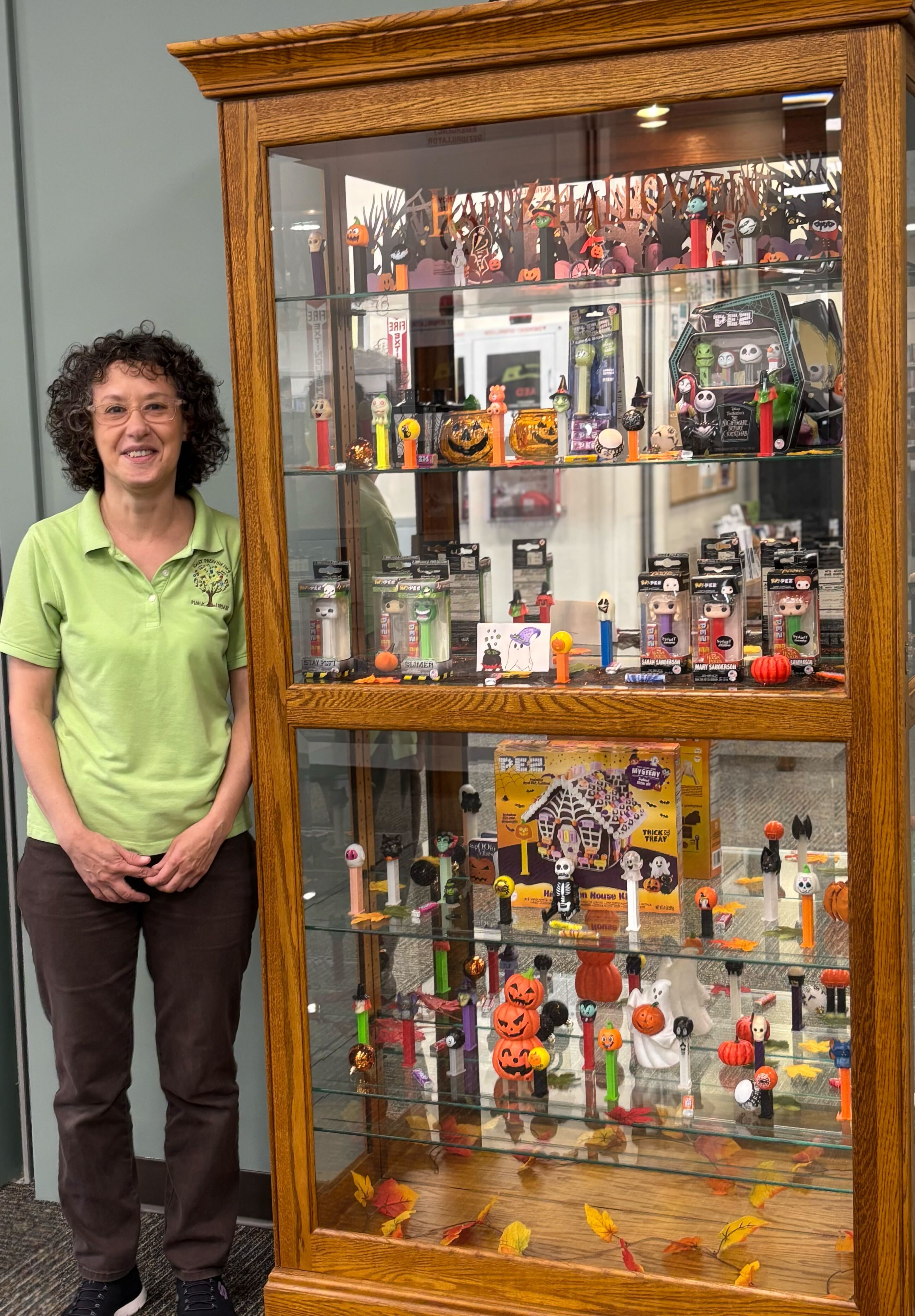 Tall display case with shelving